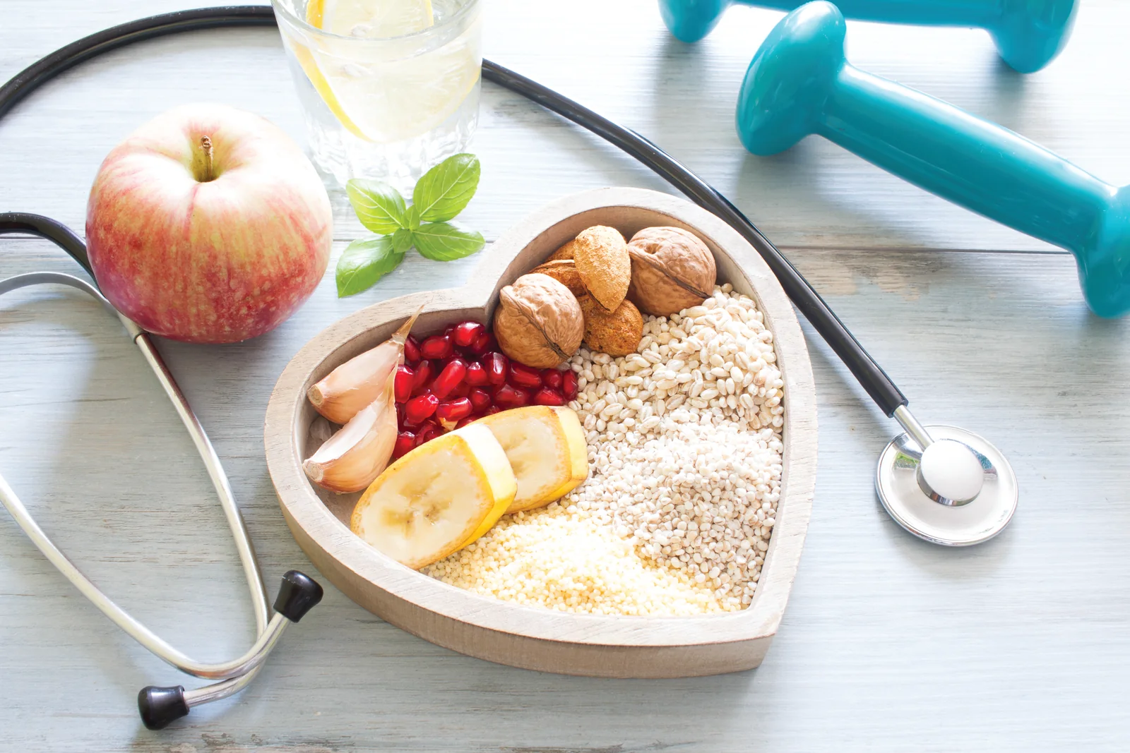 Fresh foods, grains, fruit and wellness items arranged on a table